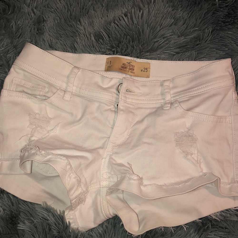 Distressed white short shorts